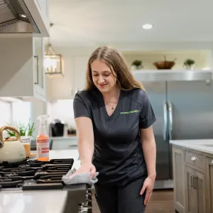 Team Member Wiping Stove